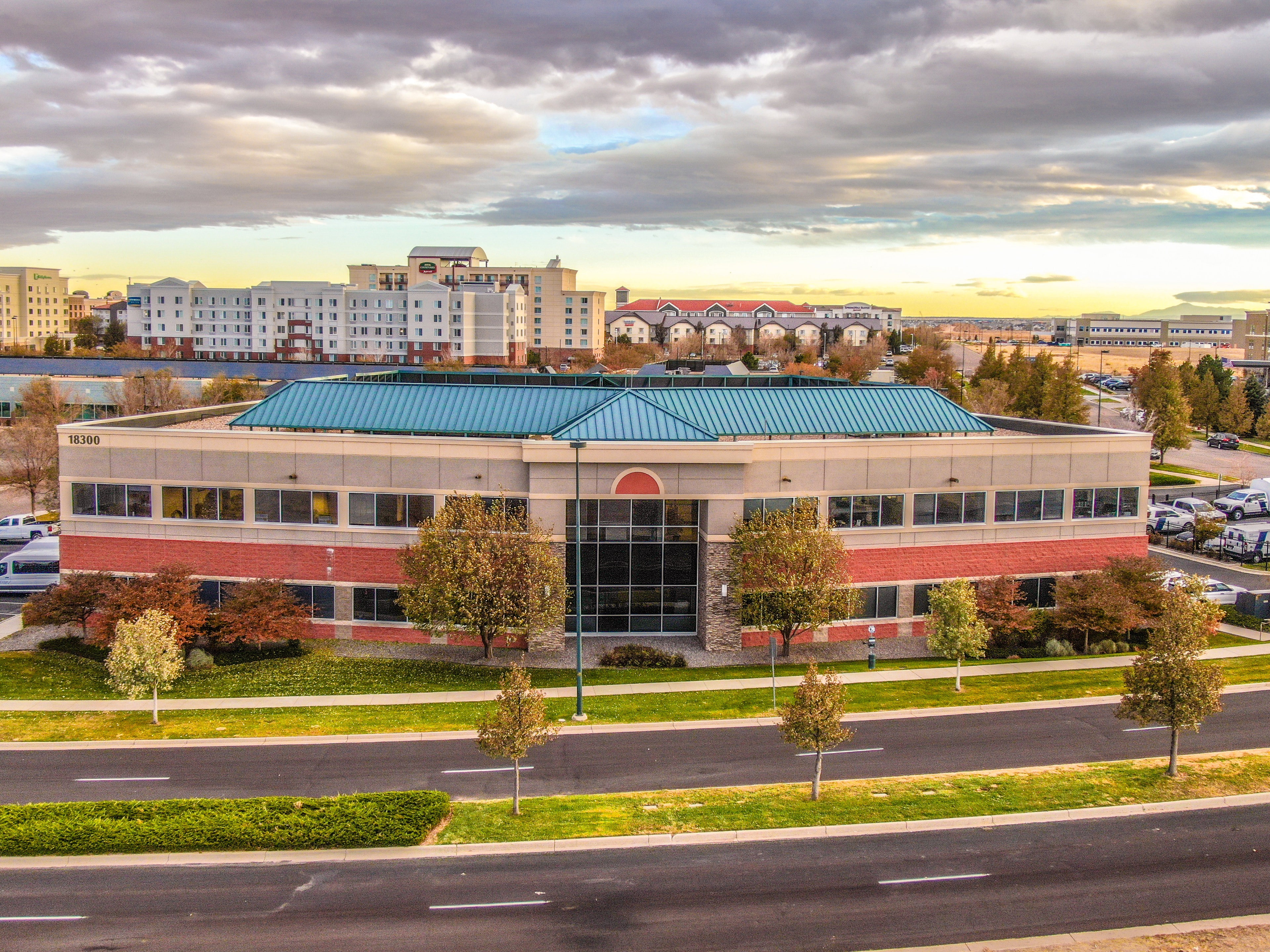 DIA Office Building street view at sunset